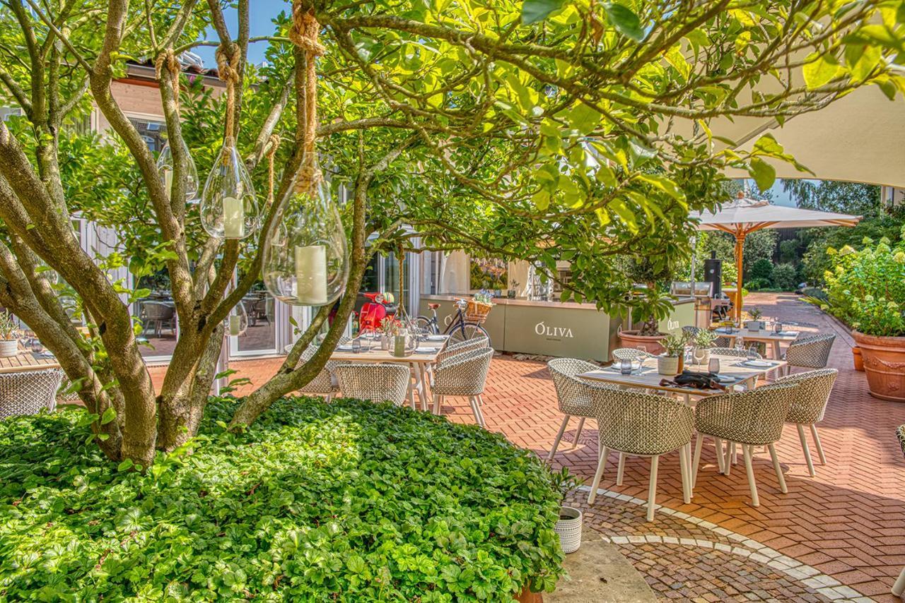 Vila Vita Rosenpark Marburg ภายนอก รูปภาพ The garden of the restaurant